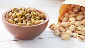Roasted and salted pistachios in a bowl