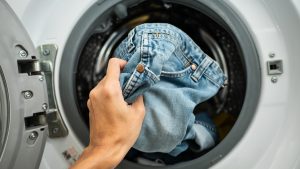 Putting Jeans into the washing machine