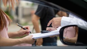 Insurance agents meet with customers when accidents occur to inspect damage and document insurance claims expeditiously. concept of car insurance agents to urgently inspect damage for customers.