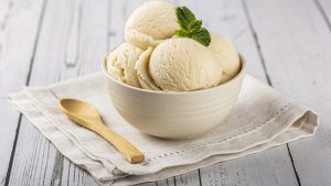 Bowl with vanilla ice cream balls.