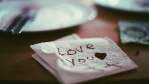 Hand written Love you note on paper napkin