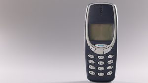 Georgia Tbilisi December 7, 2021: Original Nokia 3310 on gray background