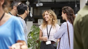 Smiling business team standing during meeting