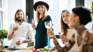 Group of friends drinking glass of wine