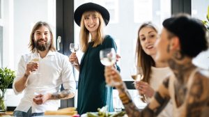 Group of friends drinking glass of wine